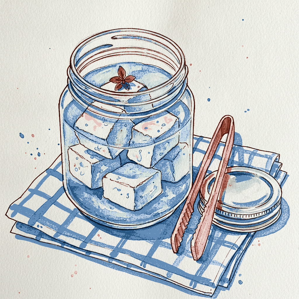 Feta blocks in brine, in a glass jar example 3