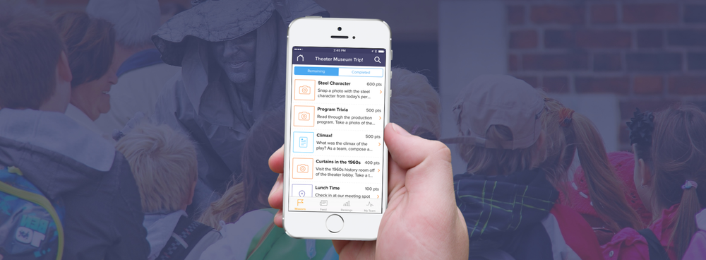 a photo of a phone with a group of people in the background