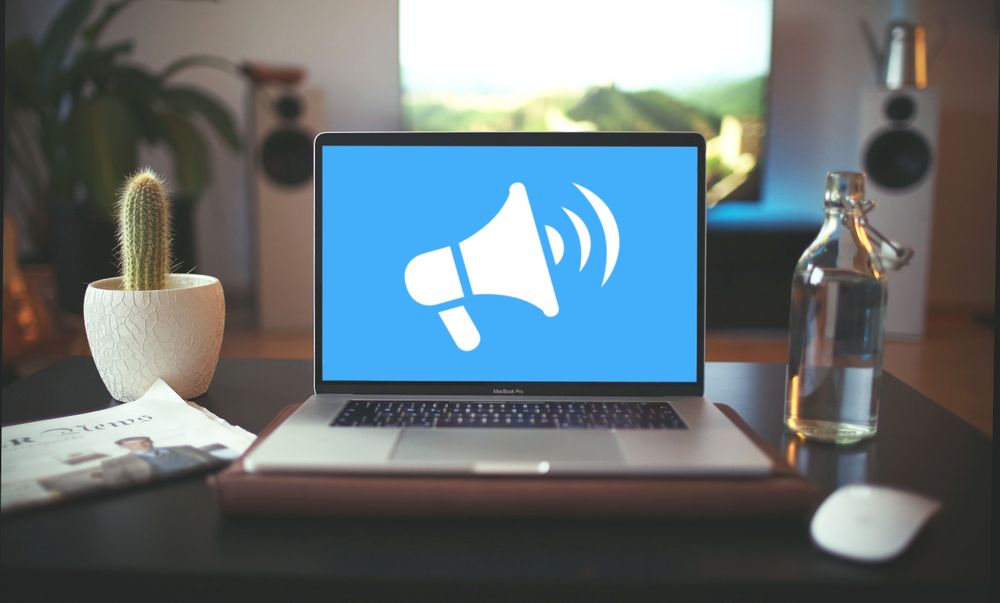 Image of a bullhorn icon on a laptop screen