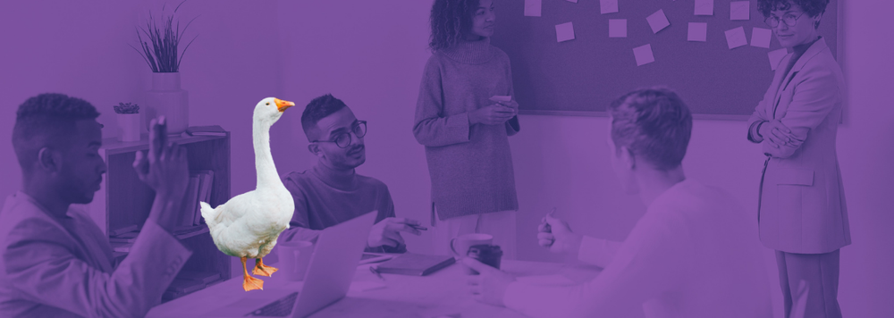 Goose on board room table