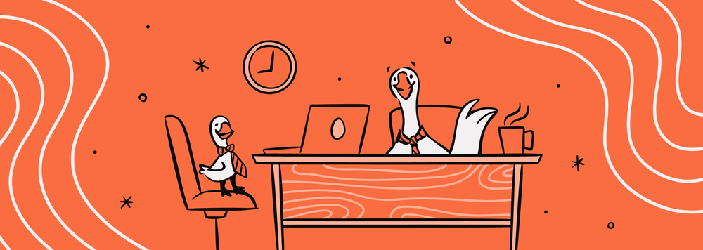 Two geese in an office