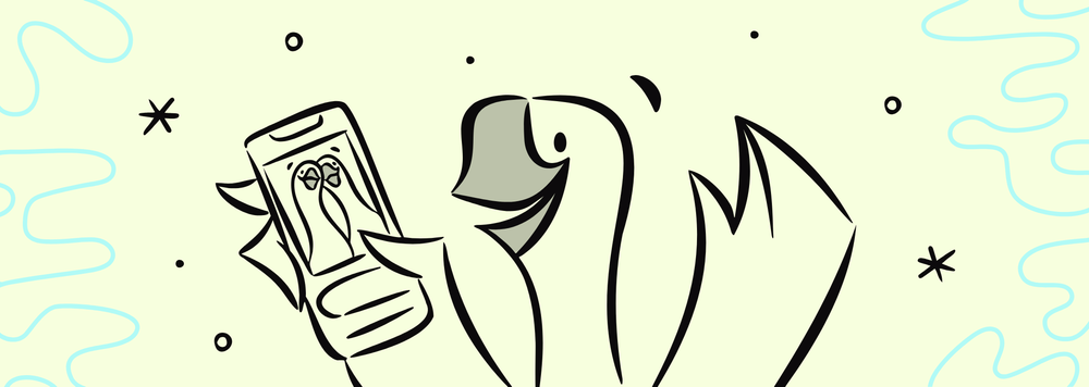 A smiling goose holding a mobile device with a photo of two geese on the screen