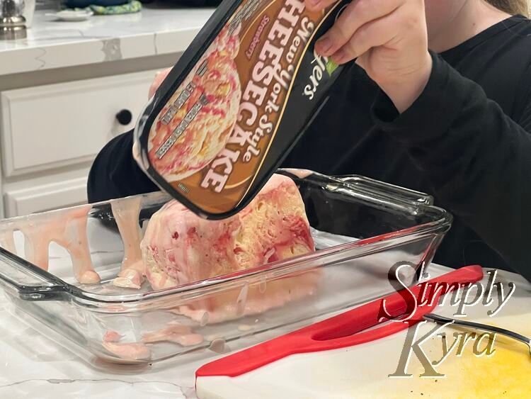 Dumping the ice cream into the pan. 