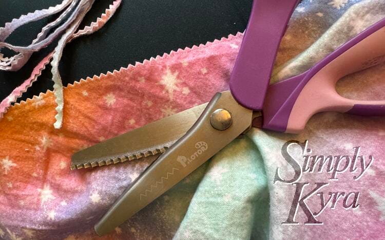 Images shown pinking shears with the cut off seam above. 