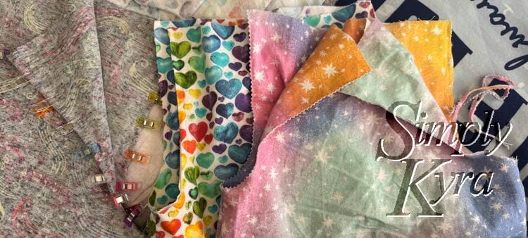 Set of sleeves showing the sewn edge (center), pinking shear trimmed curves (right), and flipped/clipped edge (left). 