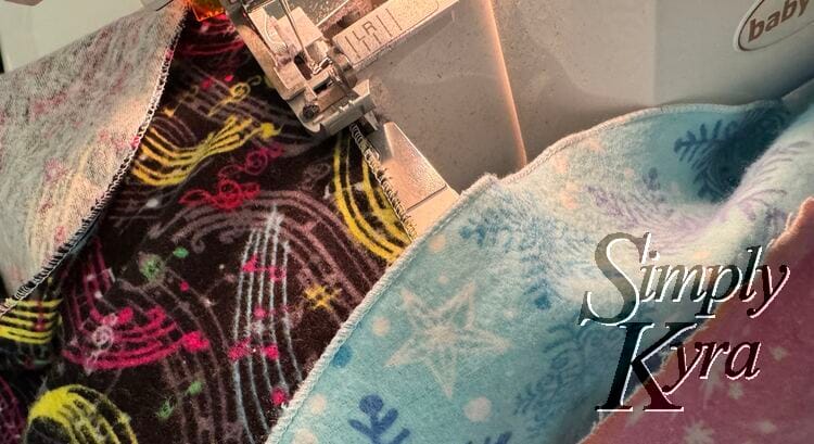 One skirt being rolled hemmed on my serger while two others (one done and one raw edged) sit beside. 