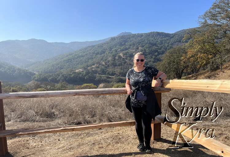 Me posing for the camera at the scenic point before continuing on.