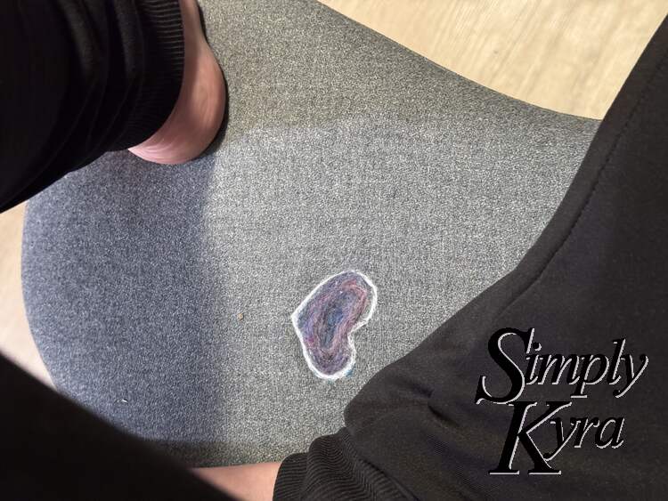 Image shows the heart sideways taken from above with my legs and feet somewhat visible.