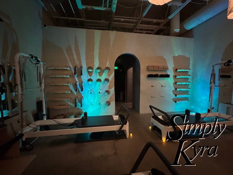 View of the studio with the lights dimmed and battery operated light and candles put out. 