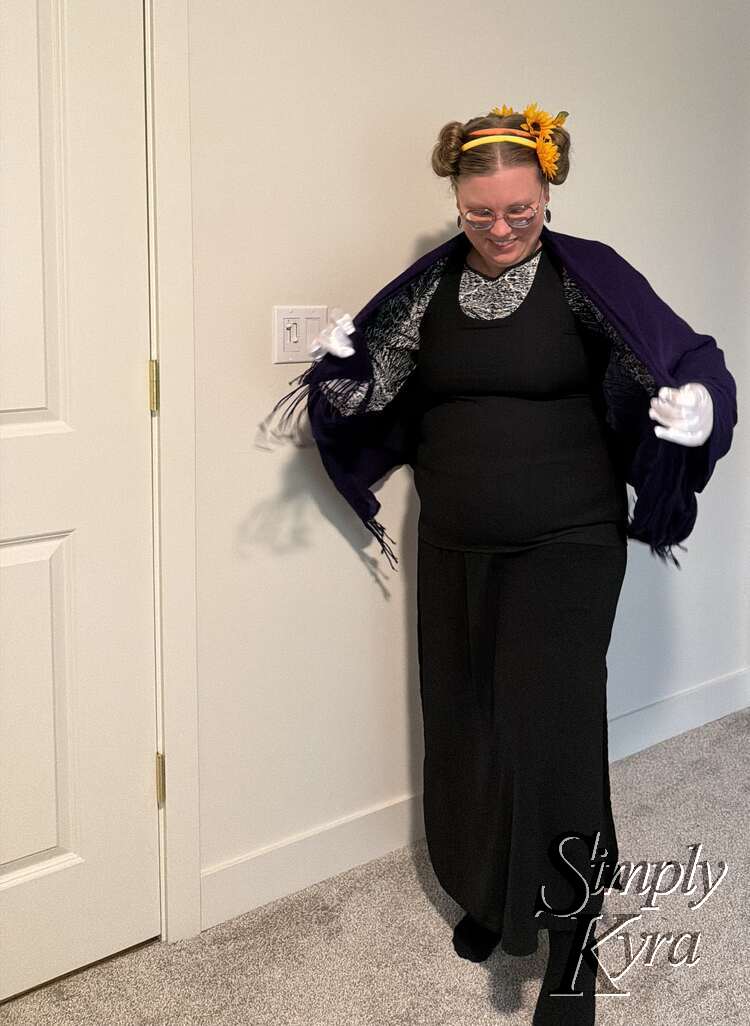 Draping open the shawl and looking down showing the headbands.