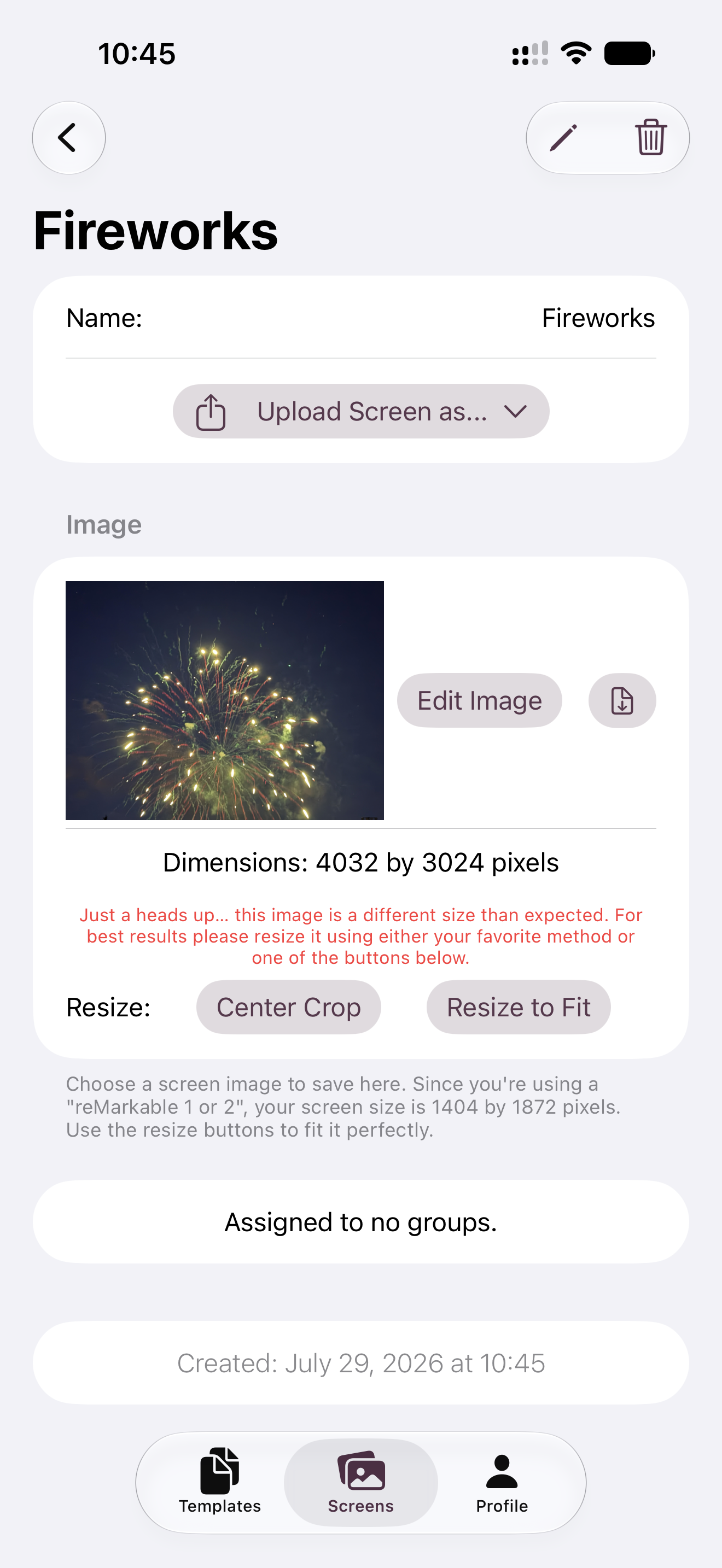 Phone screen showing a screen image named Fireworks with a warning that the image is a different size than expected, along with Center Crop and Resize to Fit buttons.