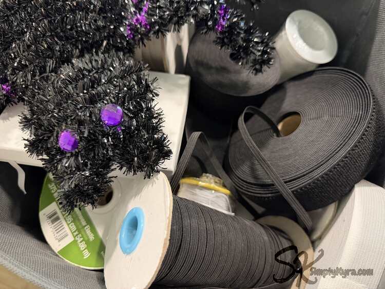 Image shows different elastic with the spider on top.