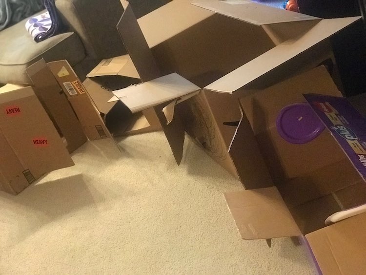 I then cut the box vertically and then horizontally so there would be a door to get into and out of the box vehicles safely.