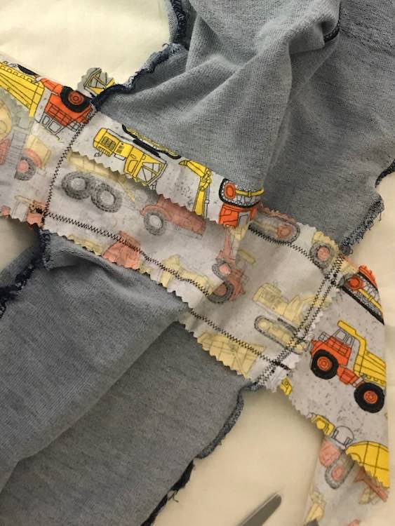 Pant legs are now sewn closed again.