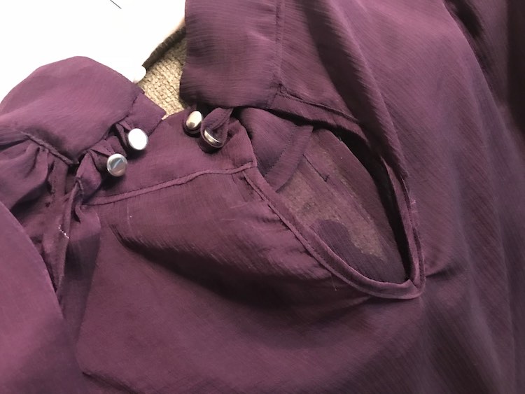 Loving the buttons on the sleeve cuffs and the back of the collar.