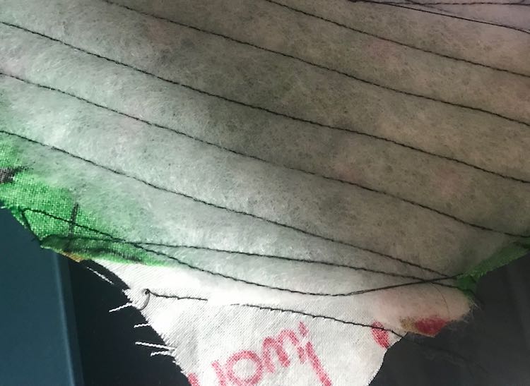 Keeping the same distance between the lines as before the stitches hardly caught the batting but I know they'll be no chance for a hole in my finished stocking now.