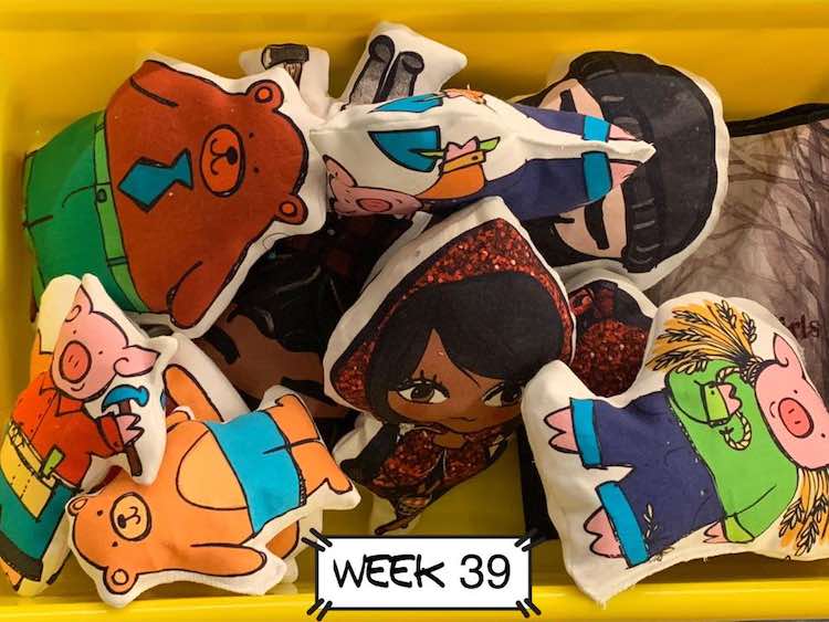 Several of the finished characters over the cooresponding quiet book.