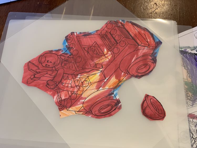 Jeep and blown away hat under the jeep.