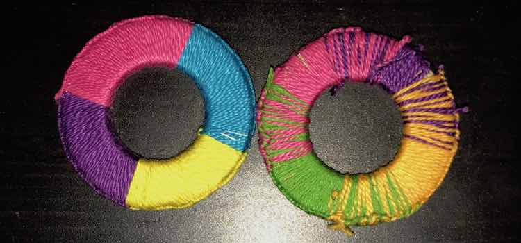 The washer on the left has abrupt colors changes starting with pink, blue, yellow, and blue. The washer on the right also consists of four colors (pink, purple, darker yellow, and green) but the more gradual changes almost trick your eyes making you think there are five colors.
