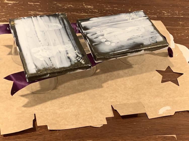 Canvases are clear around the sides and edges while still being white and wet on most of the canvas.