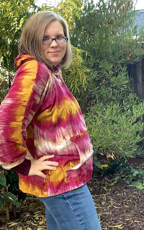 Side view of the adults Kaboom from the side. The left edge of the photo is a bit cut off but you can see the hood poking out and the side of the sleeve.