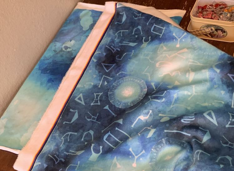 Closeup of the end of the folded coordinate placed over top of the panel so you can compare the heights.