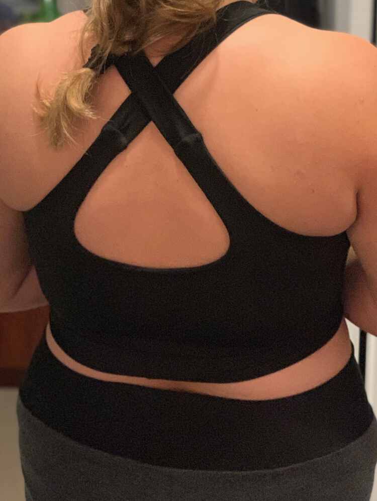Image shows a closeup of the back of my black Brazi showing the straps crossing and the seam where they are stitched together.