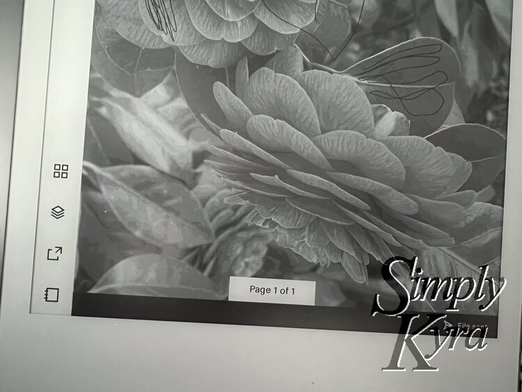 Image shows the bottom of the flower covered notebook and a black banner along the bottom saying at the far right side "File sent".