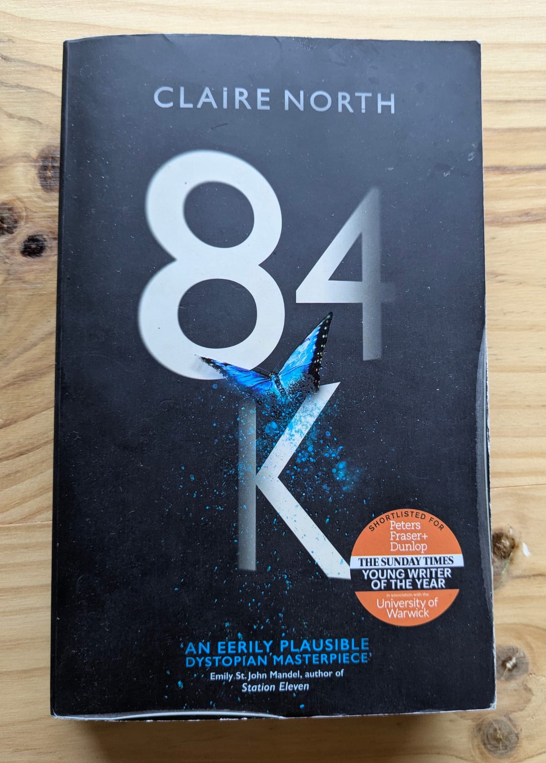 84k by Claire North, book cover