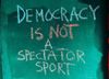 Image saying "Democracy is not a spectator sport"