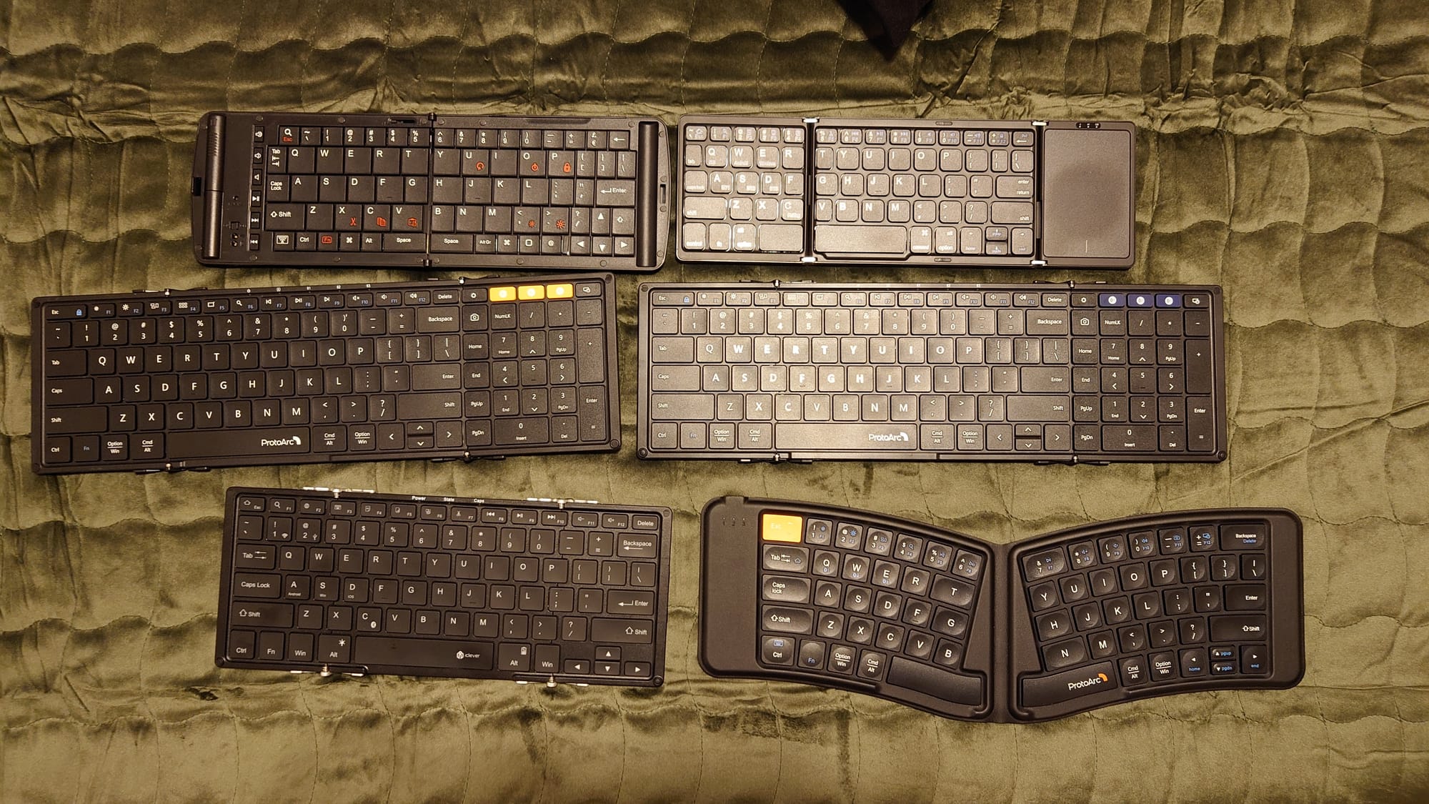 The same six Bluetooth keyboards: 1 has a trackpad, 2 have number pads, and one is V-shaped for better ergonomics