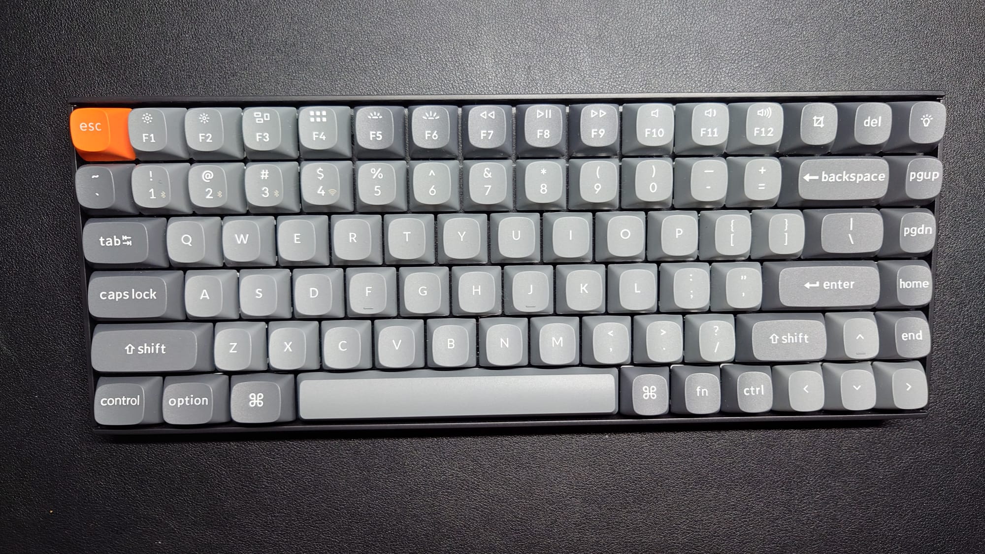 The Keychron K2 Max with standard gray keycaps except for the Esc key, which is orange.