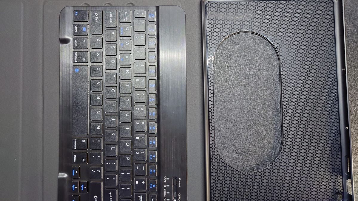 The "D Dingrich" Pixel Tablet Case open on my desk with the keyboard and cutout showing