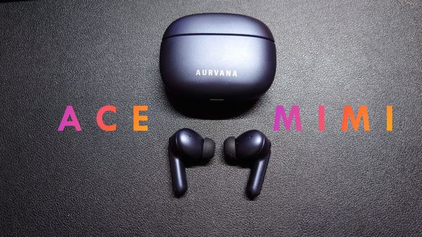 The Aurvana Ace Mimi shown with their charging case