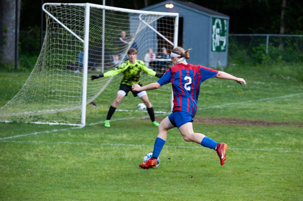 On the road to state: HHS boys soccer earns region championship title