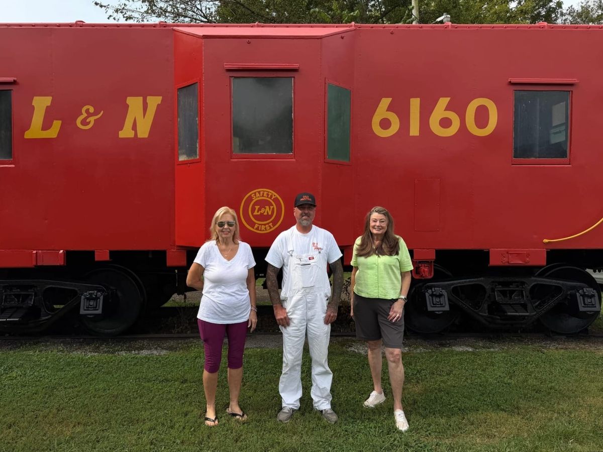 Pegram’s historic caboose gets a fresh coat of red