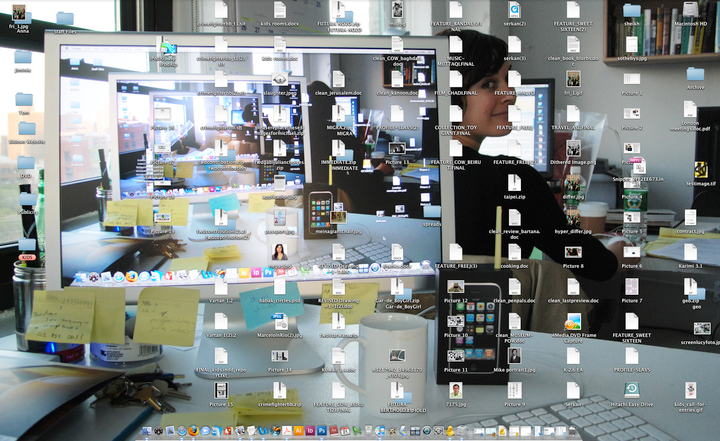 a layer image of computer desktops featuring images of the same computer desktop in recursion