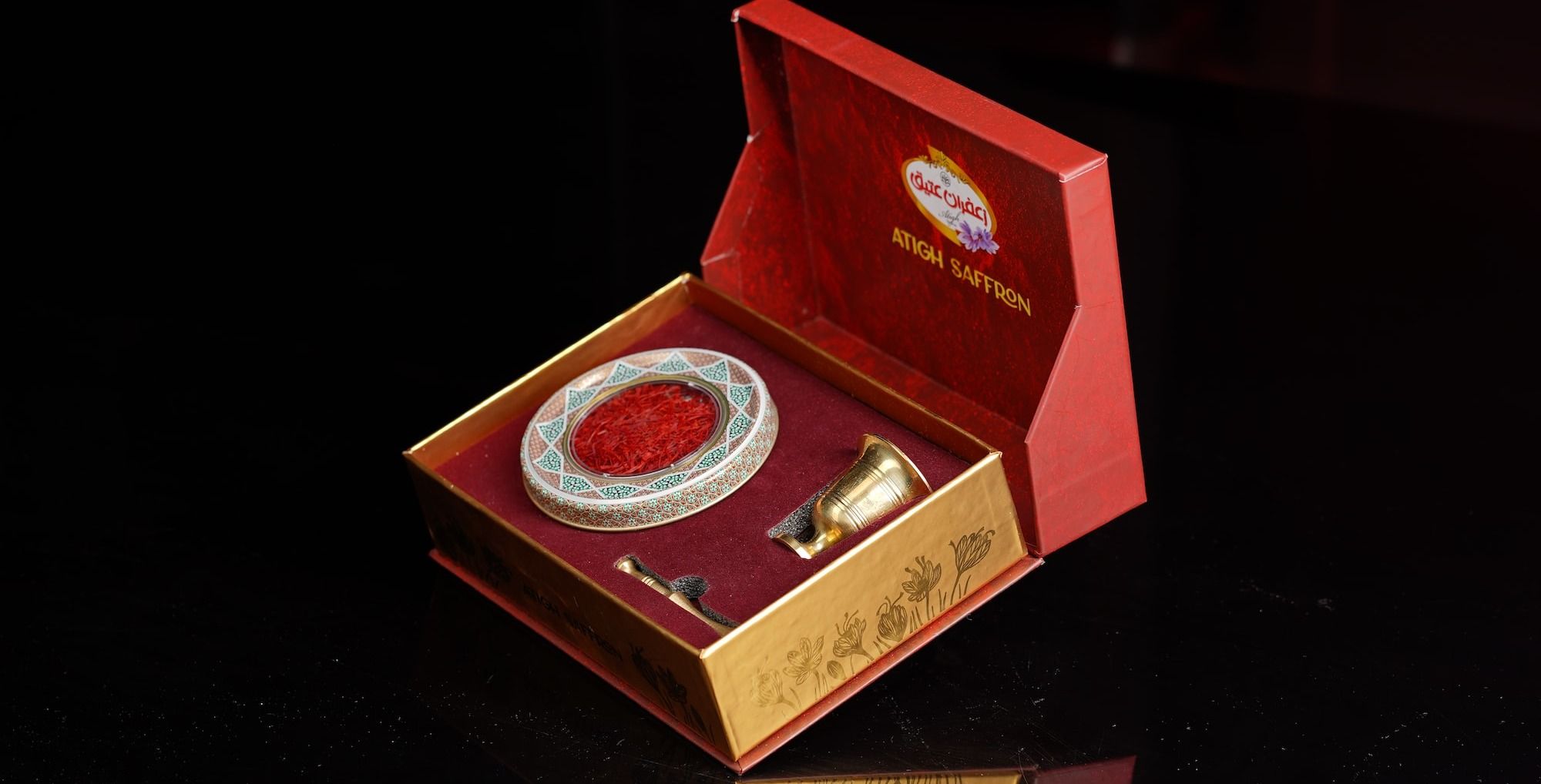a red box with a silver object inside of it