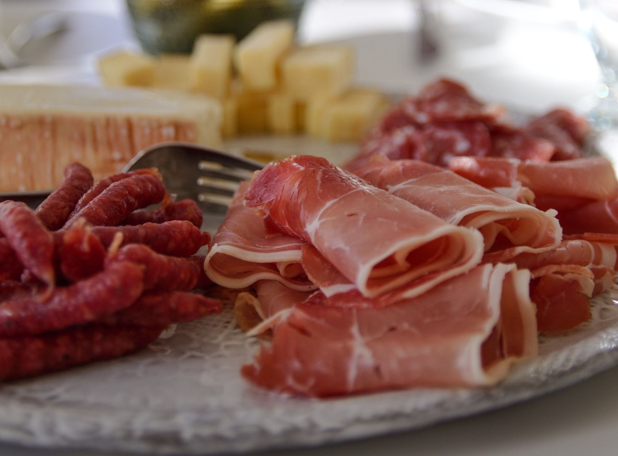 raw meat on white ceramic plate