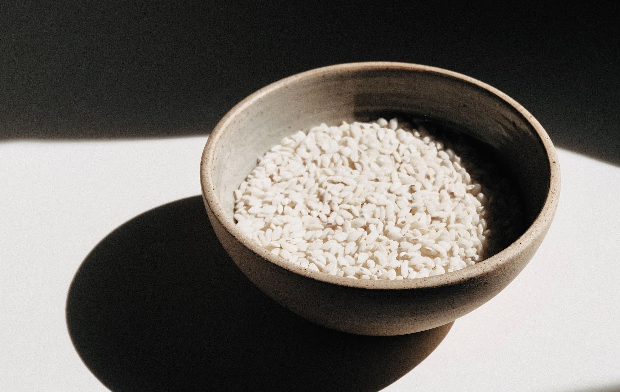 brown ceramic bowl with brown powder