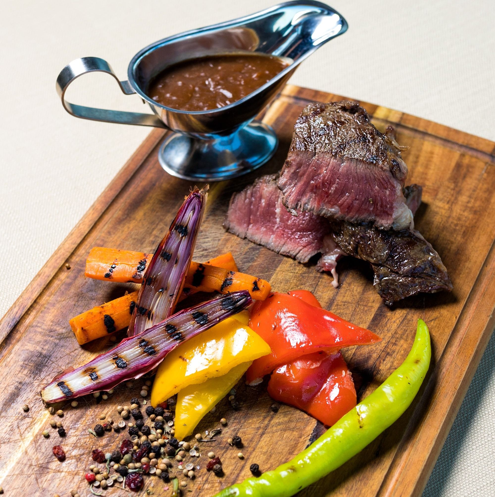 raw meat on green chopping board