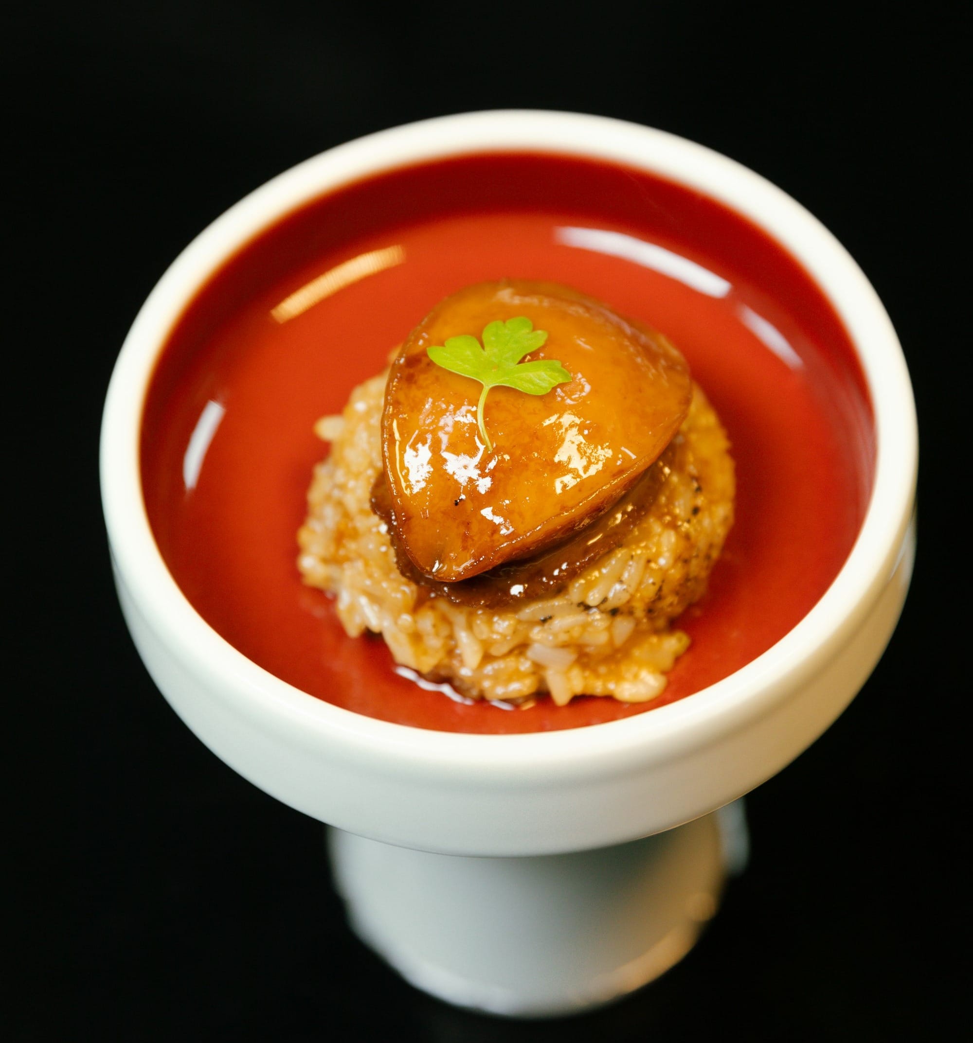 A bowl of food with a spoon in it