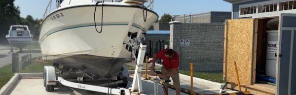 Powerwashing boats helps to preserve waters