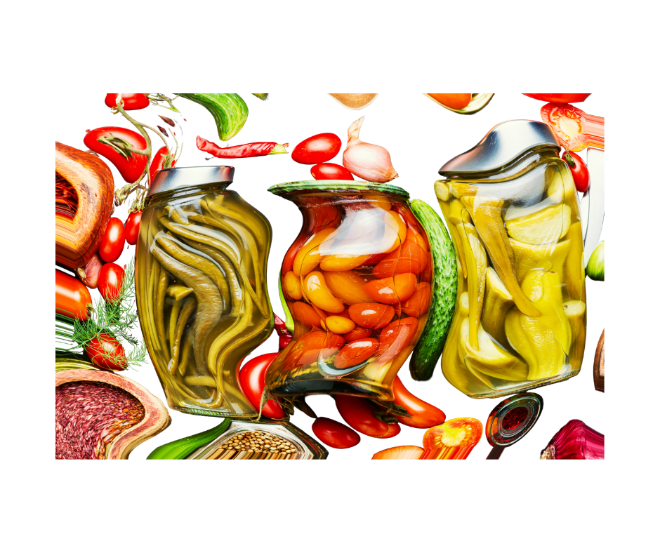 Jars of floating vegetables on a white background. 