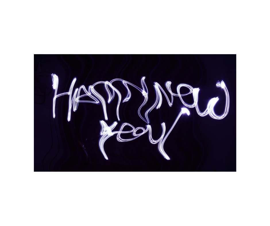 Neon distorted happy new year on black background.