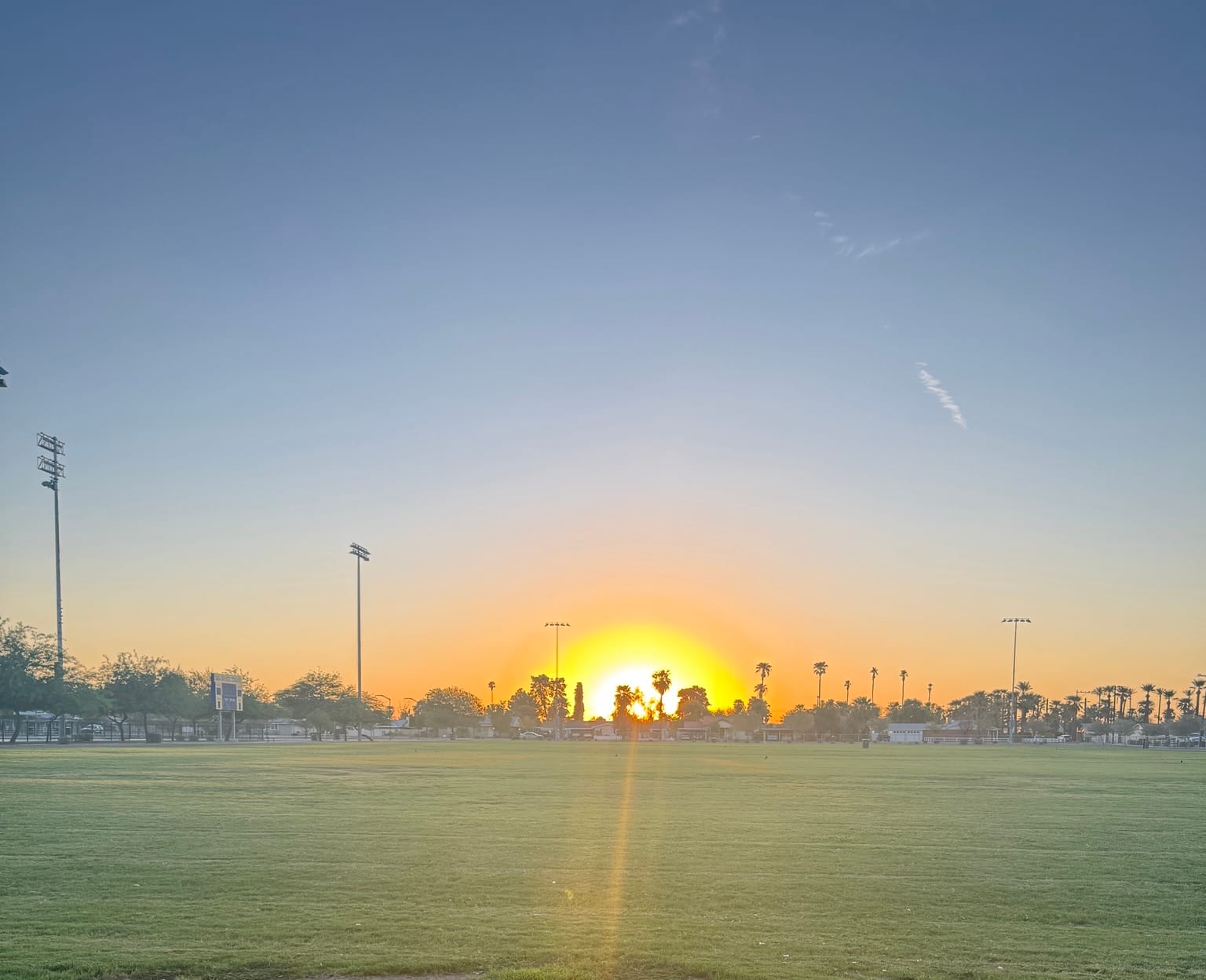 Arizona sunrise over a park in the Sonoran Desert during an early morning walk