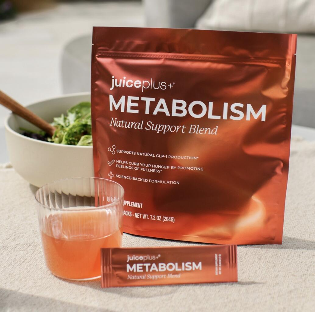 Juice Plus+ Metabolism Natural Support Blend with individual packet and prepared drink.