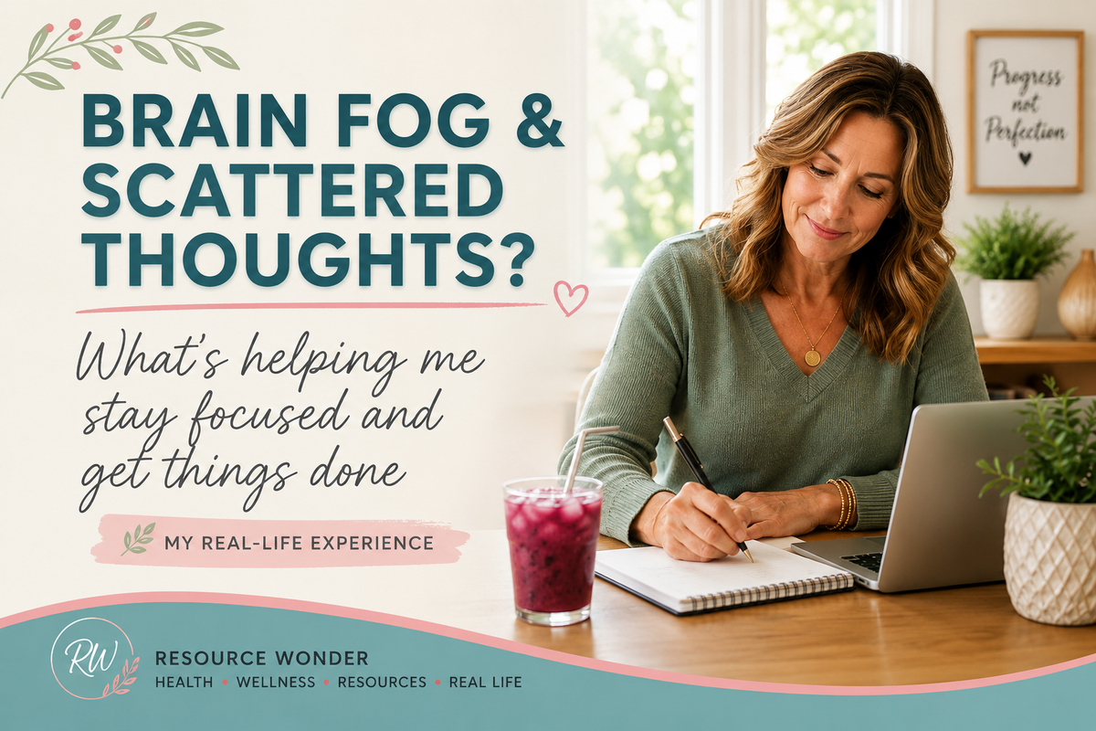 Woman writing at her desk with a laptop and berry drink, representing brain fog, energy and focus