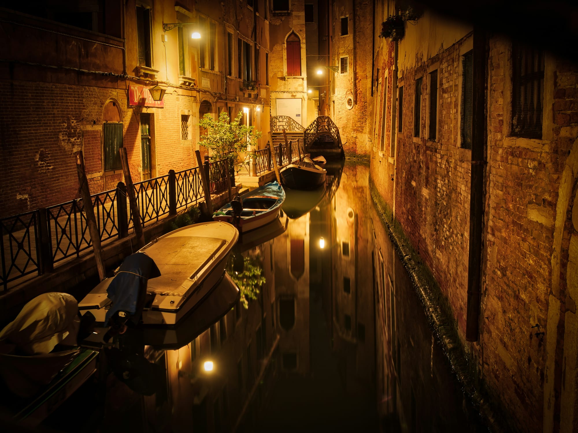 Experience the magic of Venice's canals at night. This city is worth exploring at all hours of the day.