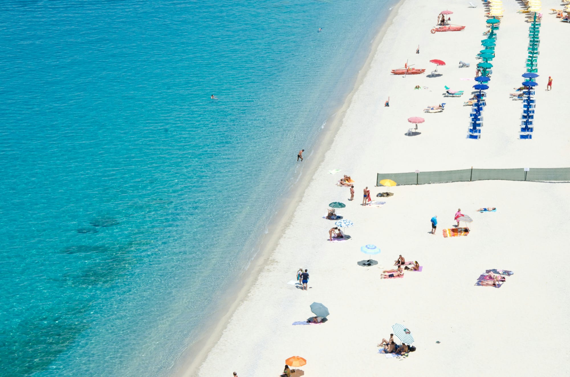 On a charming Italian beach, embrace the art of rhythm and the dolce far niente.